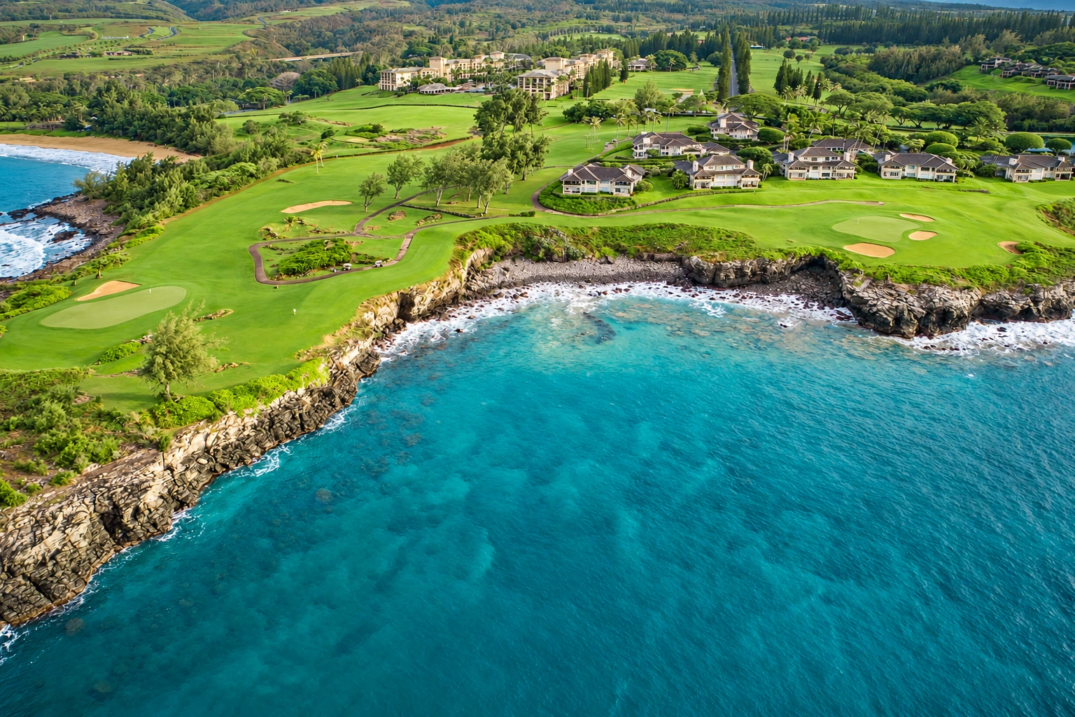 Coastal resort buildings and a golf course overlooking the ocean