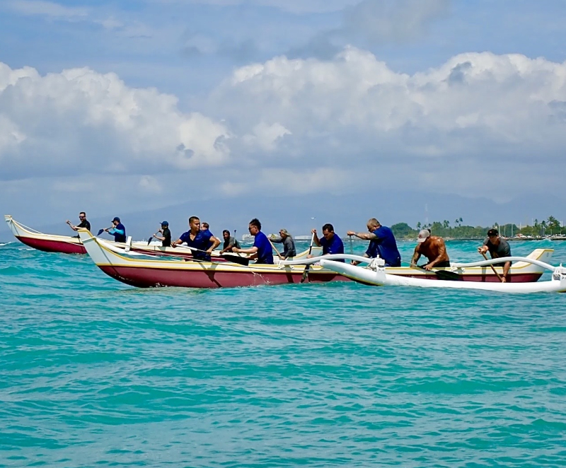PARKLINQ team · Outrigger canoe surfing